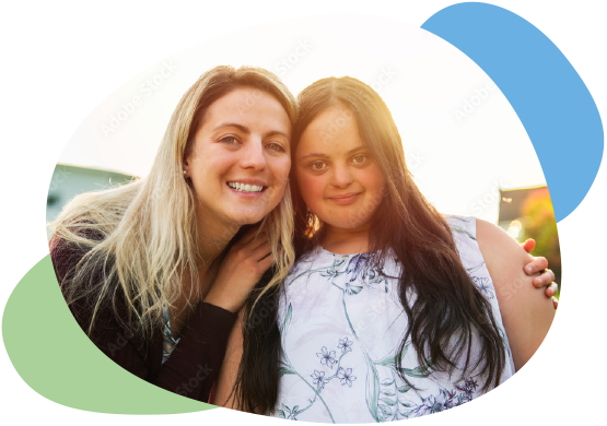 Care Staff with young adult smiling